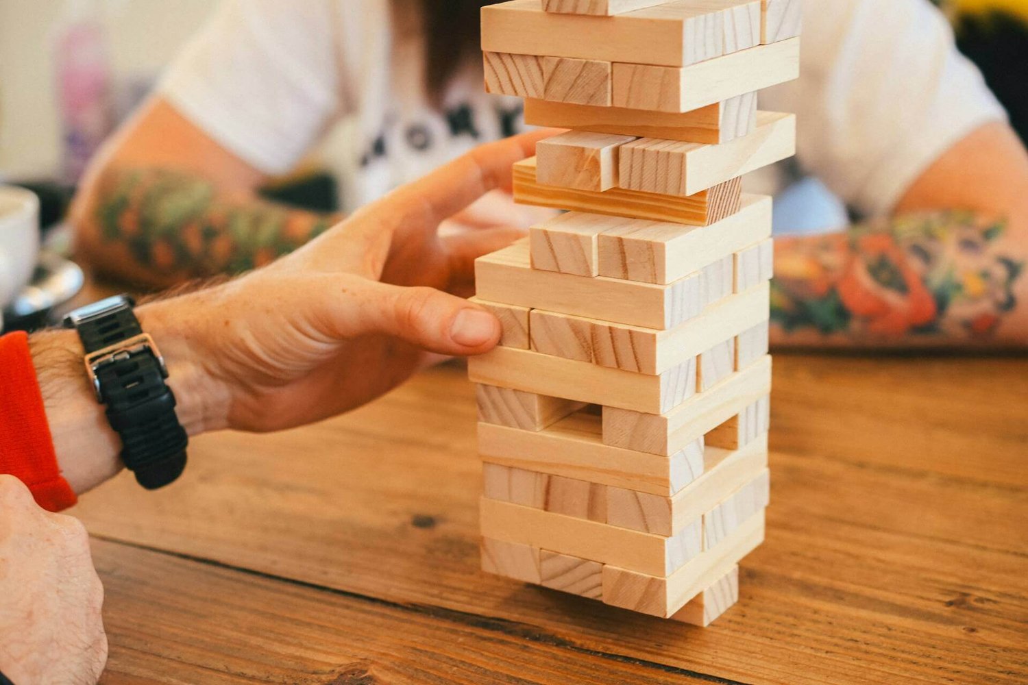 People playing Jenga