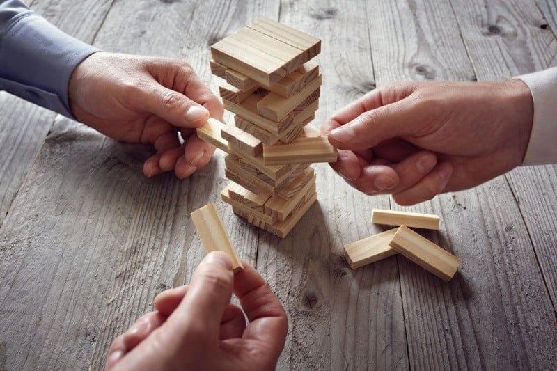 People playing Jenga